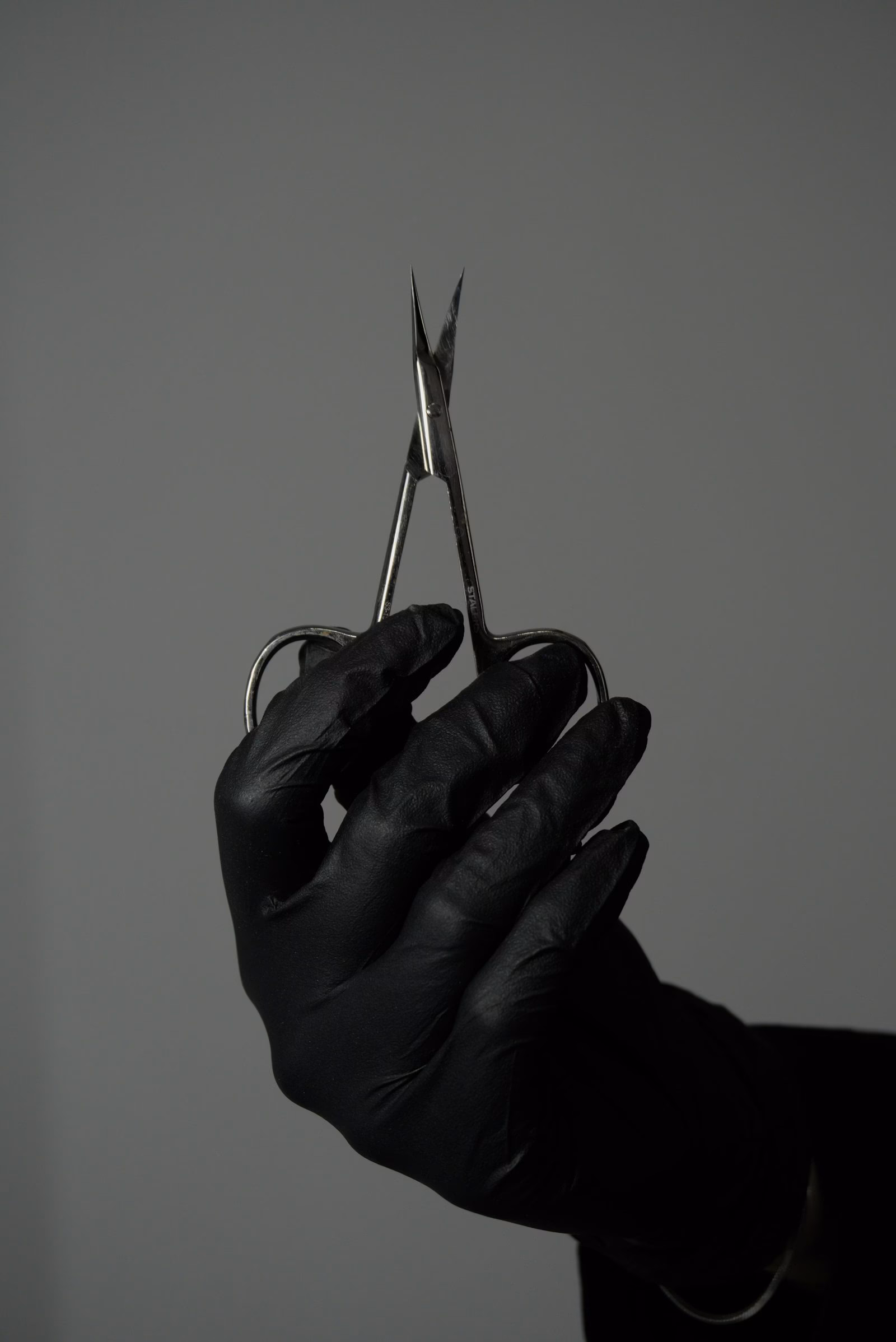 Manicure detail — shaped nails